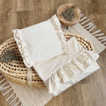 Miękki kocyk dla niemowląt w pastelowym odcieniu, idealny na spacery i do łóżeczka.